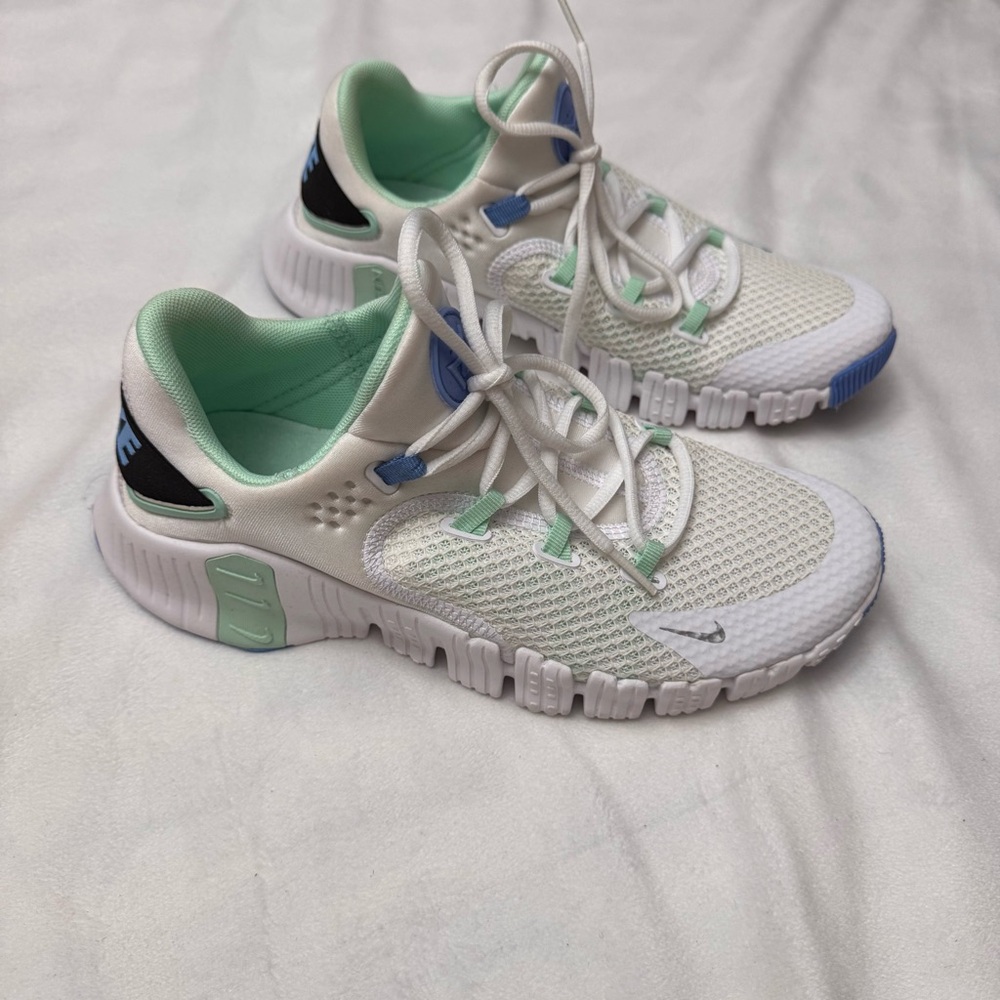 Nike Women’s Metcom 4/ size 9
